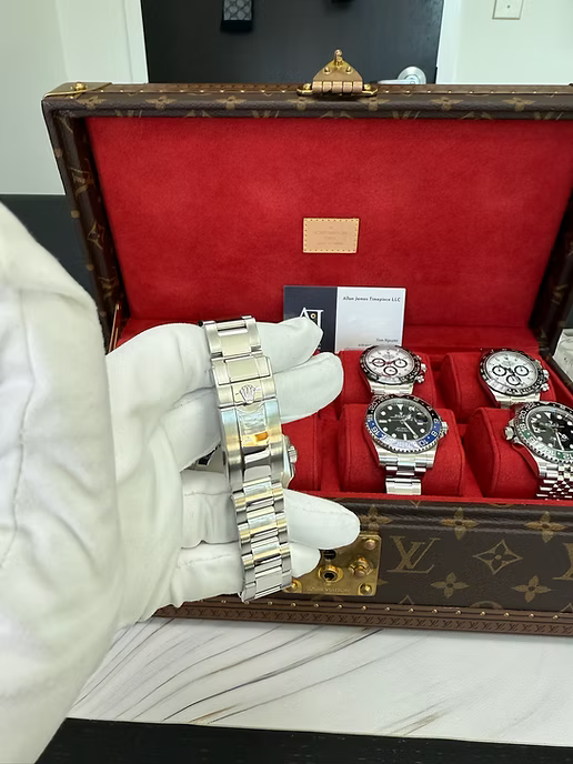 Rolex GMT-Master II "The Batman" with reference number 126710BLNR in it's box. Dial and face shown, as well as official Rolex box and documents.