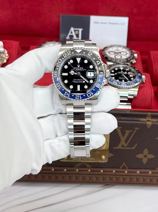 Rolex GMT-Master II "The Batman" with reference number 126710BLNR in it's box. Dial and face shown, as well as official Rolex box and documents.