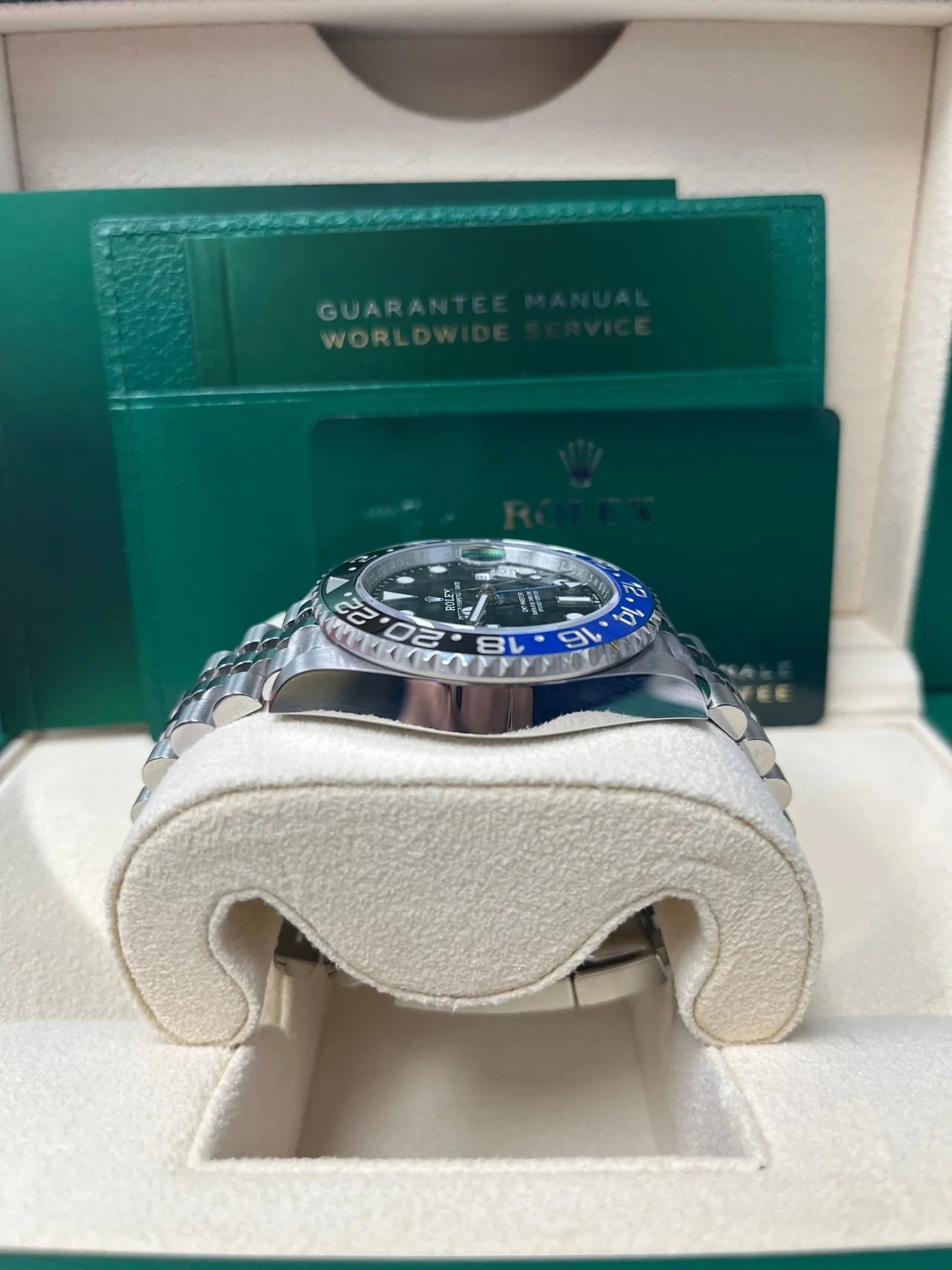 Rolex GMT-Master II "The Batman" with reference number 126710BLNR in it's box. Dial and face shown, as well as official Rolex box and documents.